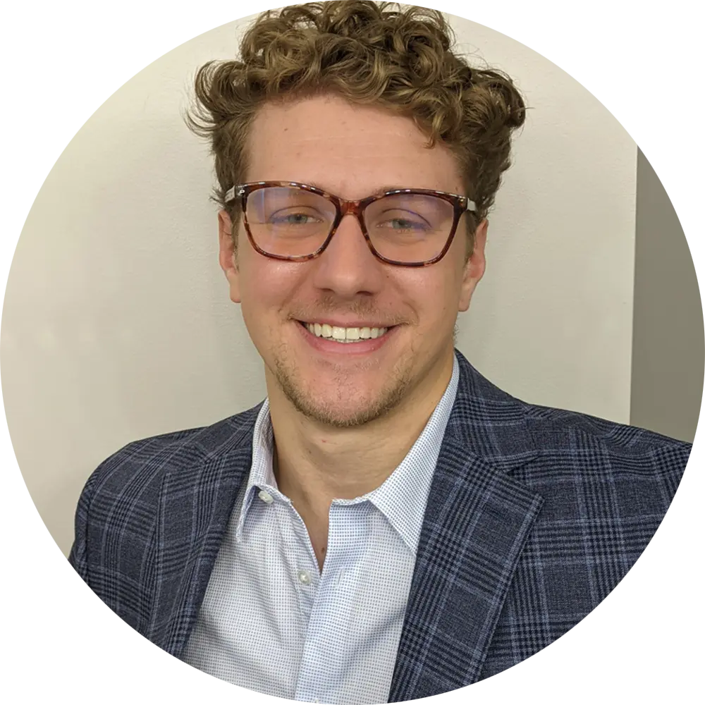 Garrett Spence wearing a blue plaid suit jacket